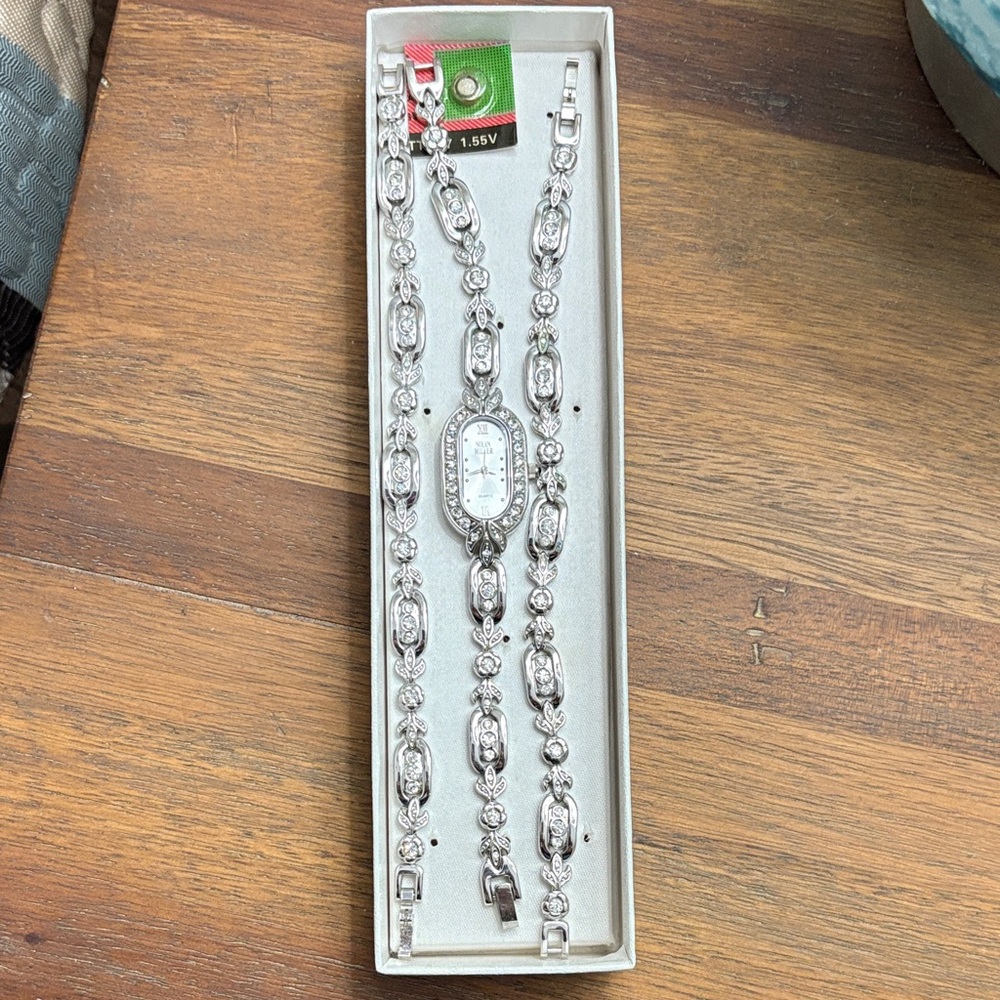 Nolan Miller Silver Quartz Watch with Crystal Accents and 2 matching bracelets